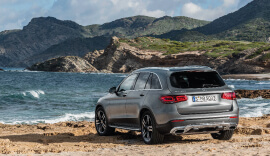 Back view of the new Mercedes-Benz GLC parked by the coast.