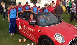 Red MINI supporting celebrity cricketer.