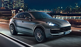 Grey Porsche Cayenne Coupe.