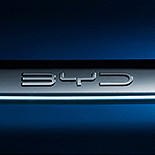 BYD logo, dark studio lighting